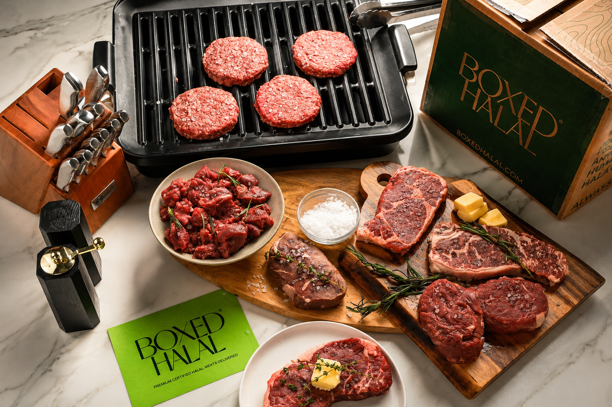 Boxed Halal steaks and burgers on the grill